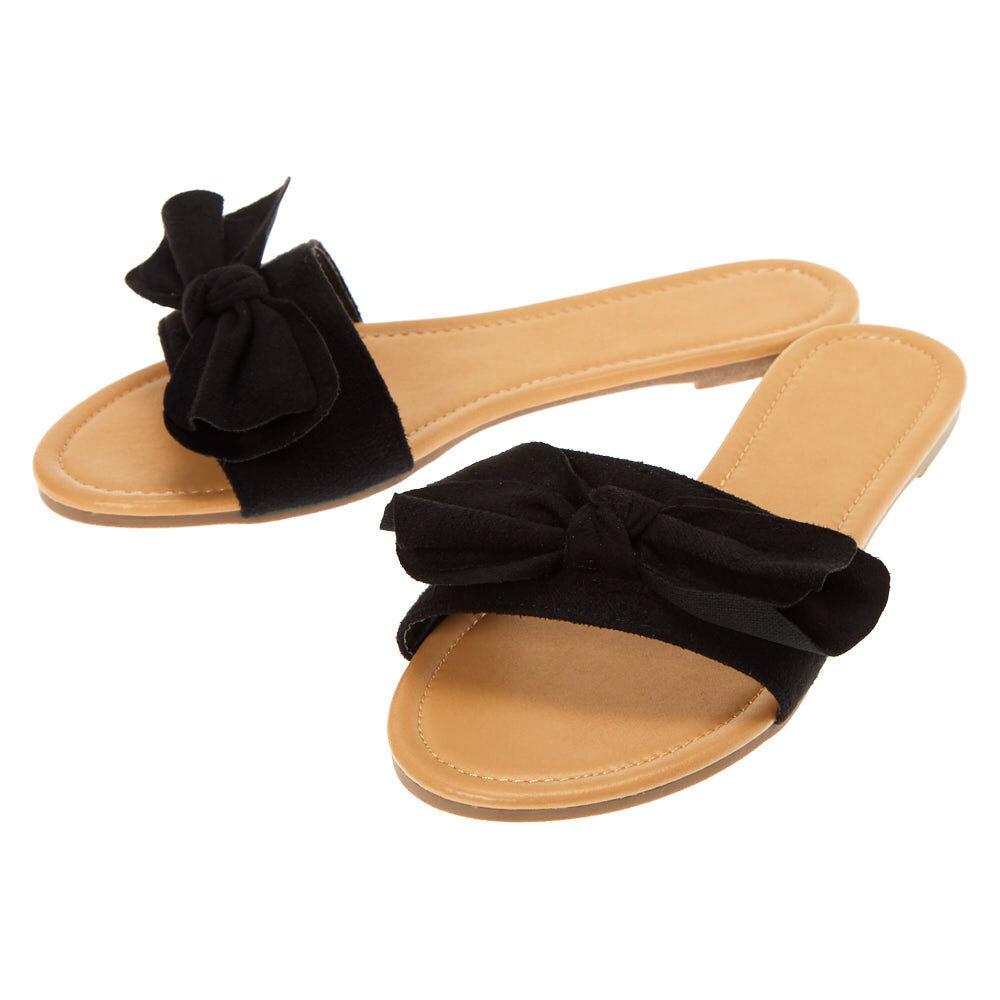 black sandals with a bow