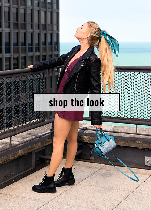 ponytailed woman with a mini handbag